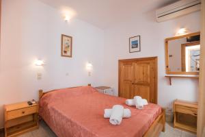 Postel nebo postele na pokoji v ubytování Florance Apartments & Rooms