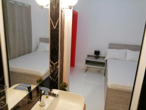 Una cama o camas en una habitación de Jz Plus Classio