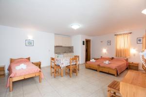 Postel nebo postele na pokoji v ubytování Florance Apartments & Rooms