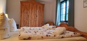 Ein Bett oder Betten in einem Zimmer der Unterkunft Ferienhaus Igel