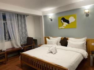Postel nebo postele na pokoji v ubytování Mellow Fellow Hostel