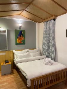 Postel nebo postele na pokoji v ubytování Mellow Fellow Hostel