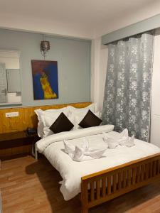 Postel nebo postele na pokoji v ubytování Mellow Fellow Hostel