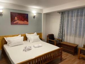 Postel nebo postele na pokoji v ubytování Mellow Fellow Hostel