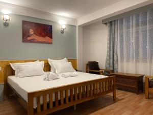 Postel nebo postele na pokoji v ubytování Mellow Fellow Hostel