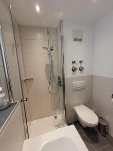 Ванна кімната в Ferienwohnung Steibis / Allgäu