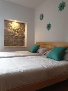 Postel nebo postele na pokoji v ubytování Villa Rosa