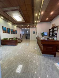 an office lobby with a reception desk at Coral View Hotel & Resort in Caye Caulker