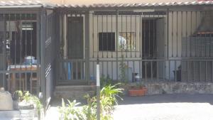 a black cage with a door and some plants at Casa Rural EL PUENTE in Taganana