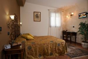 Posteľ alebo postele v izbe v ubytovaní Agriturismo - B&B L'Acquacotta + 37 fotografií