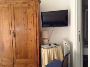 TV a/nebo společenská místnost v ubytování 2 Be Home Colosseo