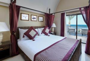 Säng eller sängar i ett rum på Jaz Belvedere Resort