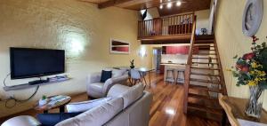 Televisyen dan/atau pusat hiburan di Great Escape Lofts