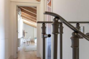 Posteľ alebo postele v izbe v ubytovaní Palazzo Tergesteo Tirabora Suite Apartments