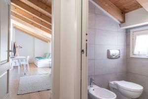 Kúpeľňa v ubytovaní Palazzo Tergesteo Tirabora Suite Apartments