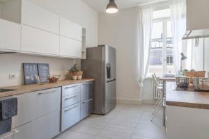 Kuchyňa alebo kuchynka v ubytovaní Palazzo Tergesteo Tirabora Suite Apartments + 12 fotografií