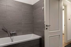 Kúpeľňa v ubytovaní Palazzo Tergesteo Tirabora Suite Apartments