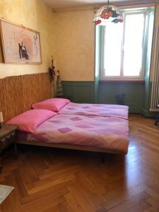Postel nebo postele na pokoji v ubytování Chambres d'Hotes Le Passiflore