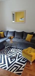 Posezení v ubytování APARTMAN SUNFLOWER
