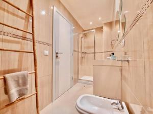 Kúpeľňa v ubytovaní Aromas Suites Apartments