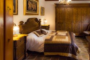 Posteľ alebo postele v izbe v ubytovaní Gallart - Turistico rural
