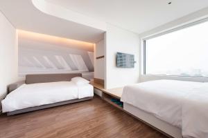 Tru by Hilton Bac Giang City Centre客房内的一张或多张床位