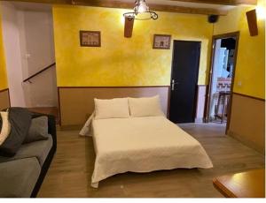 מיטה או מיטות בחדר ב-Casa Tijeras I