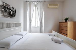 Posteľ alebo postele v izbe v ubytovaní PrimoPiano - Copernico 49