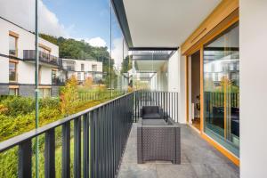 Balkon lub taras w obiekcie Tropica Garden - Nowe Kolibki