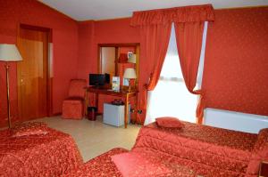 Postel nebo postele na pokoji v ubytování Hotel Shasa