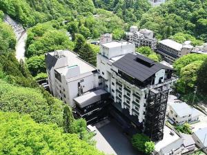 an overhead view of a large building in a city at Kutsurogijuku Chiyotaki in Aizuwakamatsu