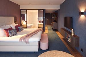 Postel nebo postele na pokoji v ubytování Van der Valk Hotel Haarlem