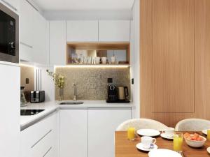 A cozinha ou kitchenette de Adagio Premium The Palm