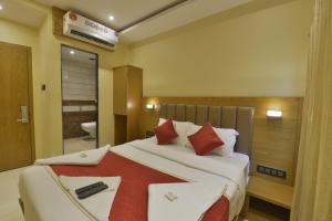 Postel nebo postele na pokoji v ubytování Hotel Residency Park