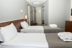 Uma cama ou camas num quarto em Doğa Thermal Health & Spa