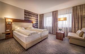 Ein Bett oder Betten in einem Zimmer der Unterkunft Meinl Hotel & Monteursunterkunft