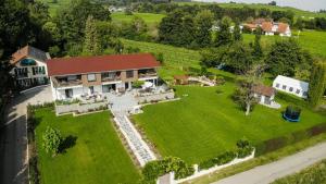 an aerial view of a house with a large yard at Rosenhof in Stetten