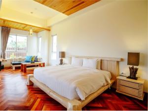 Voodi või voodid majutusasutuse Bay Forest Boutique Hotel - Silver Pavilion toas