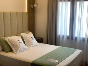Postel nebo postele na pokoji v ubytování Jardines de la Mata Boutique Beach