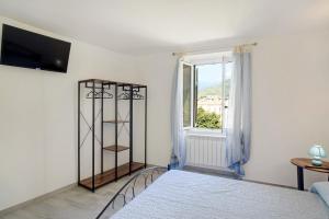 Posteľ alebo postele v izbe v ubytovaní G House Dolceacqua