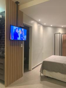 TV i/ili multimedijalni sistem u objektu Apartamento Studio na Beira Mar de Pajuçara - todo reformado