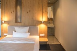 Llit o llits en una habitació de Hotel Annenhof GmbH