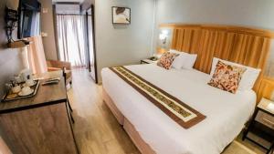 Postel nebo postele na pokoji v ubytování Starlight Inn