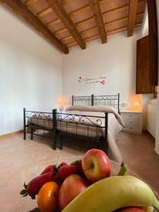 Кровать или кровати в номере Locanda della Pieve