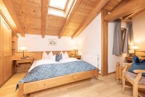 Łóżko lub łóżka w pokoju w obiekcie Wellnessappartements Margit