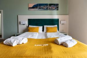 Postel nebo postele na pokoji v ubytování Hotel Limone