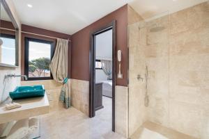 Koupelna v ubytování Hotel Cala Lunga