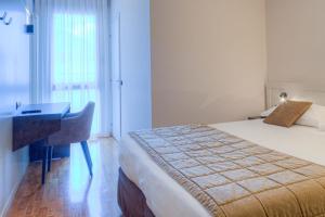 Voodi või voodid majutusasutuse Hotel Belvedere Thiene toas