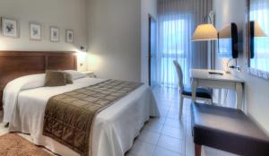 Voodi või voodid majutusasutuse Hotel Belvedere Thiene toas