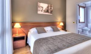 Voodi või voodid majutusasutuse Hotel Belvedere Thiene toas